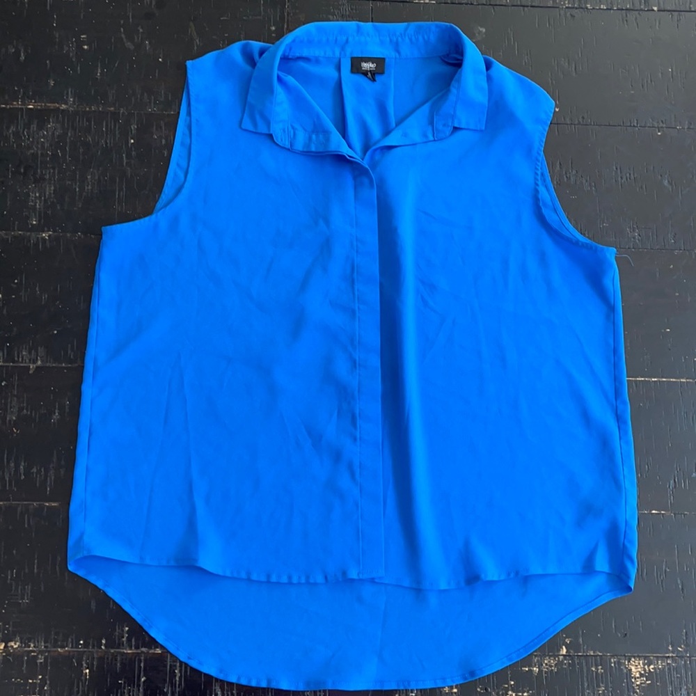 Blue Blouse it’s 100% Polyester